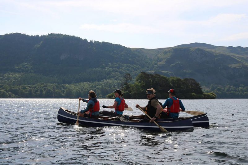 George Fisher's staff canoeing on the River Derwent
