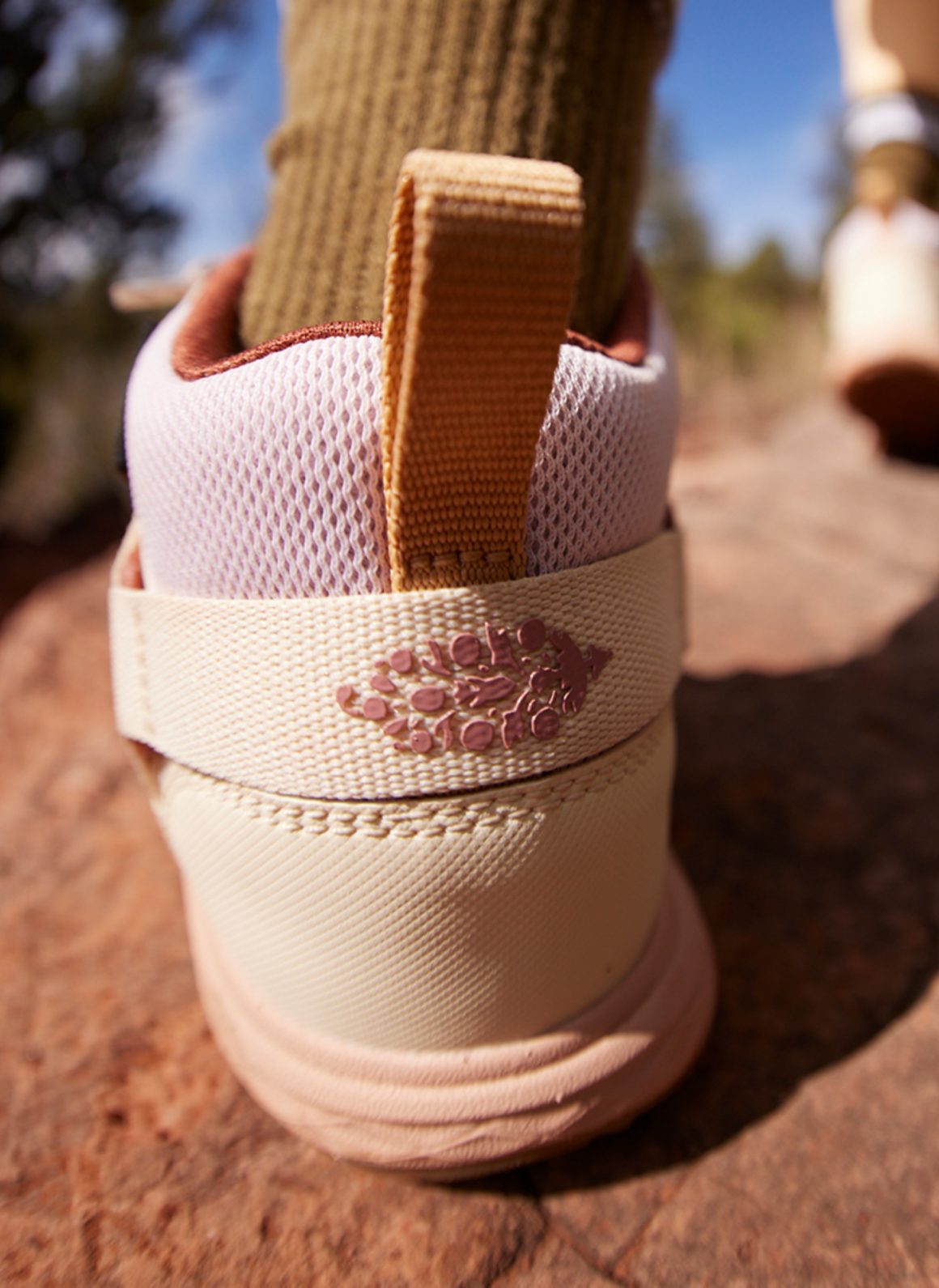 image of logo on the back of teva x free people movement trainer