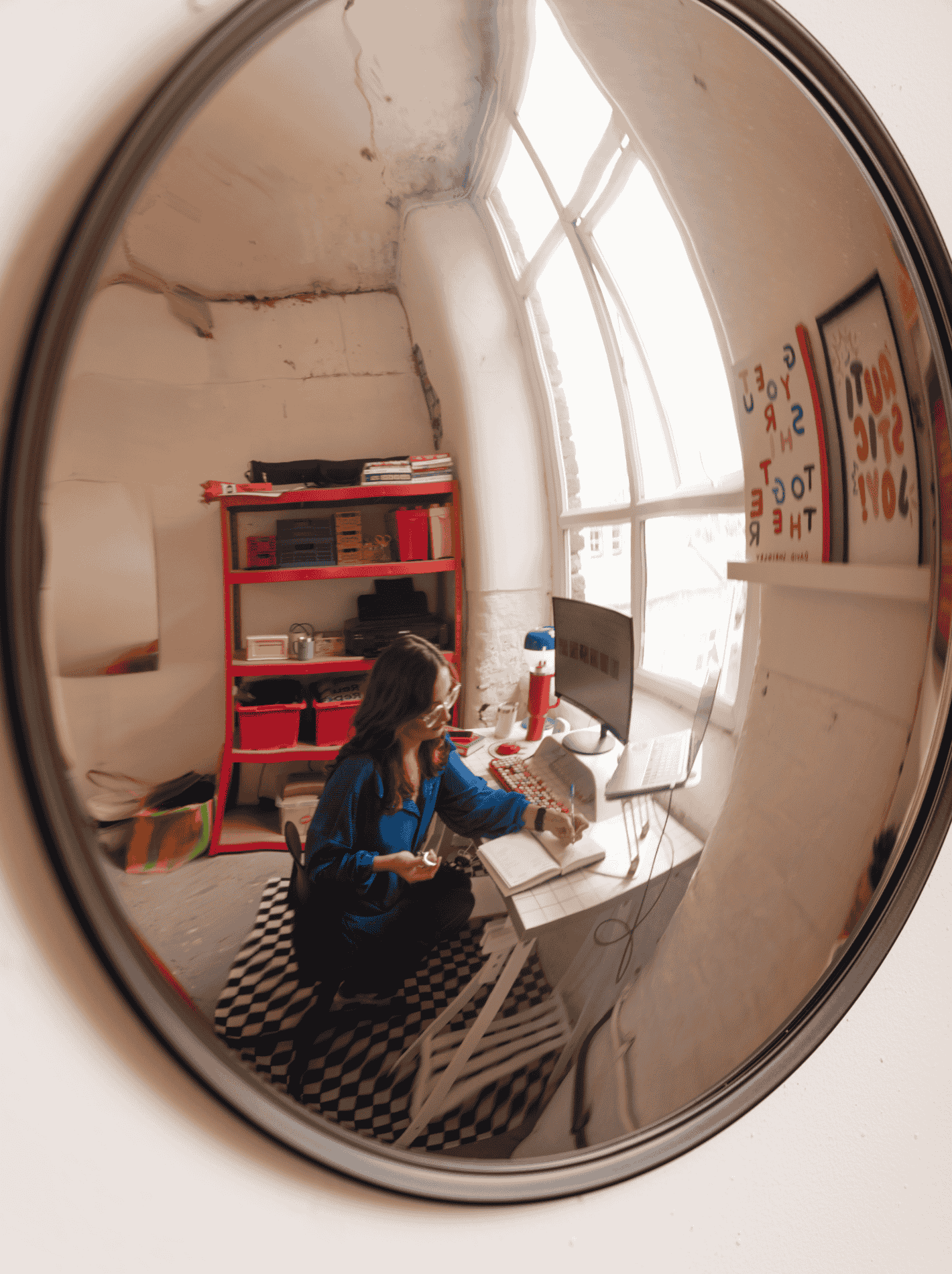 A mirrored image of neurodiversity advocate Ellie Middleton