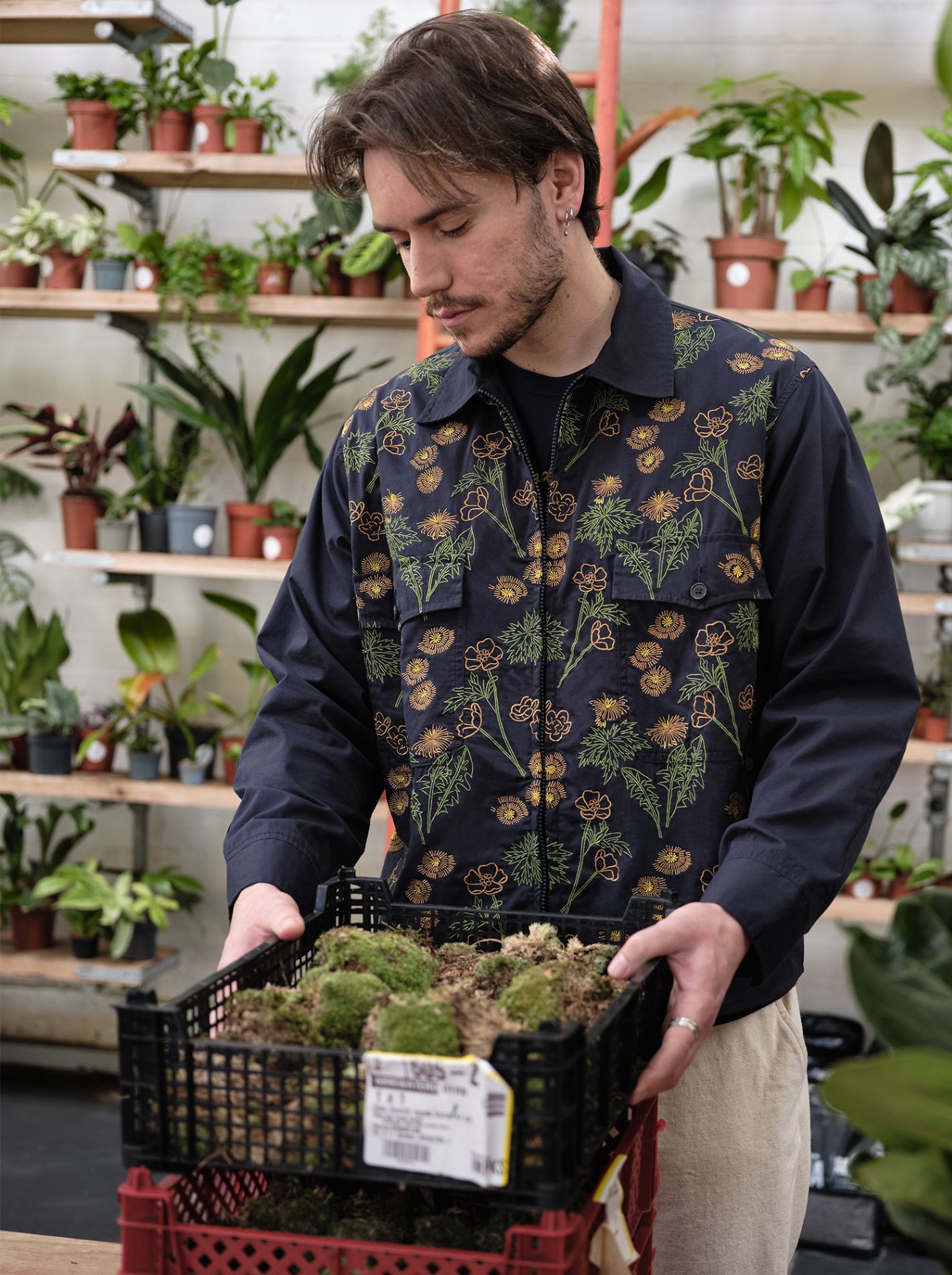 Universal Works collaboration with Flower Mountain. Embroidered jacket featured on male model