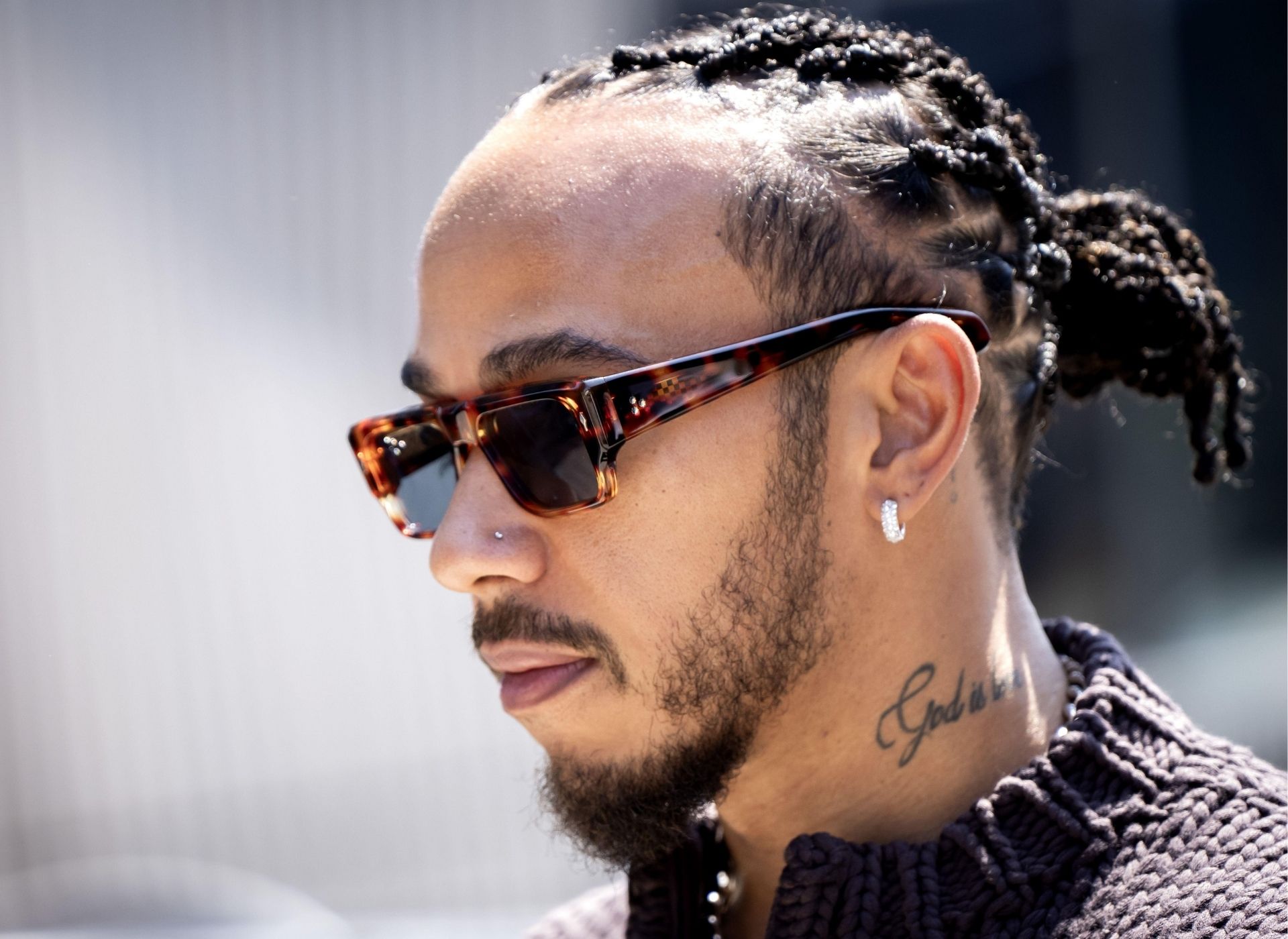 Lewis Hamilton featured wearing sunglasses
