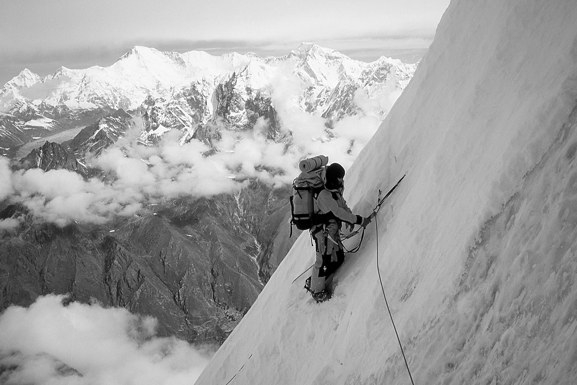 Alison Hargreaves climbing out of the notch between the nortwest summit of Kangtega and the plateau beneath the main summit. Photo © Mark Twight 1986.